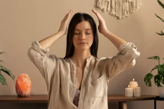 Therapist guiding meditation or self-care routine in a peaceful room.