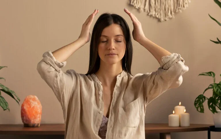 Therapist guiding meditation or self-care routine in a peaceful room.